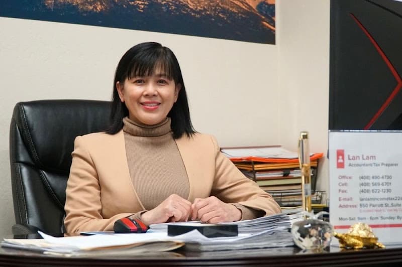 LAN LAM INCOME TAX BY LAN LAM, ENROLLED AGENT