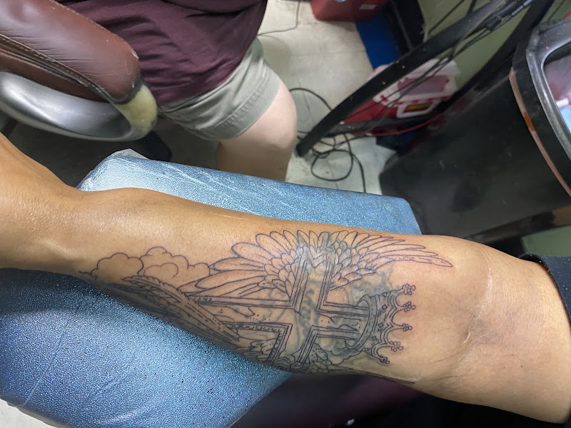 Skin Graphics Tattoos & Body Piercing 3