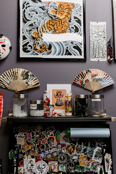 Mythic Needles Tattoos & body piercings