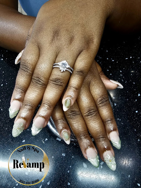 Revamp nails (15% off any services for new customers) 1