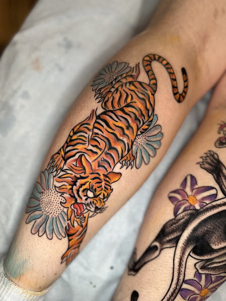 Floating World Tattoos and Body Piercing