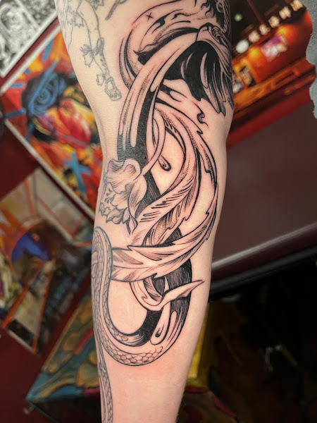 Floating World Tattoos and Body Piercing 4