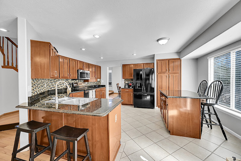 Kim Wermerskirchen | The W Real Estate Group | MetroBrokers Littleton Real Estate Agent | Highlands Ranch Agent | Parker 5