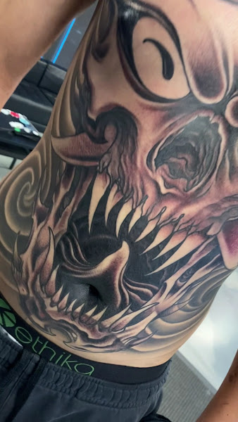 Mantra Tattoo and Piercing 3